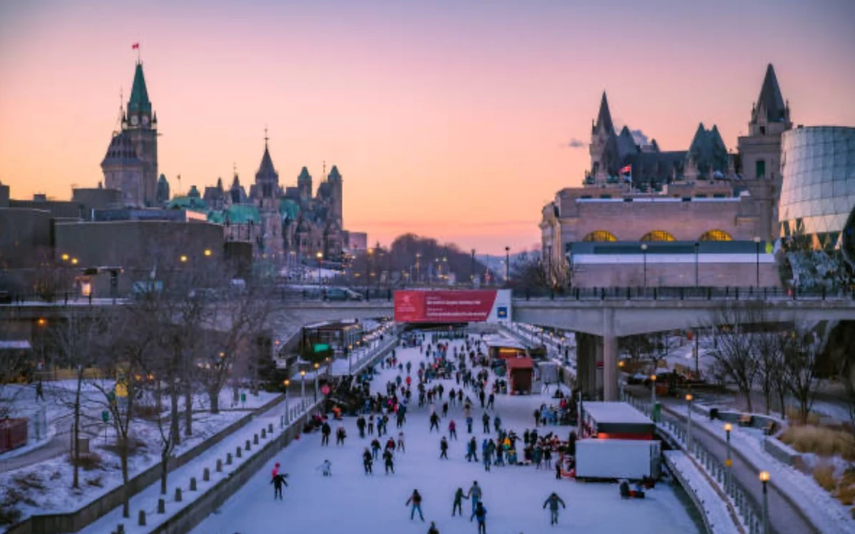 Downtown Ottawa and its lit landmarks seen in the evening
